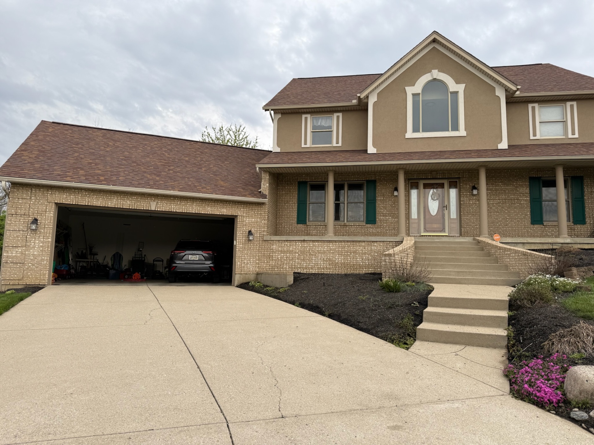 Two-story brick home exterior wash in Southwest Ohio